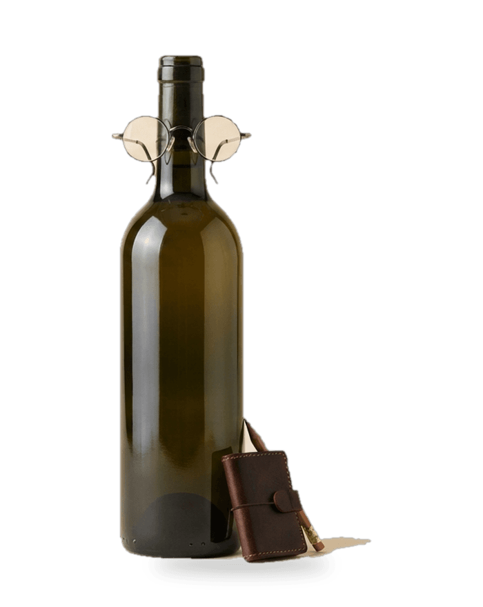 A wine bottle with a handwritten tasting note tied to its neck